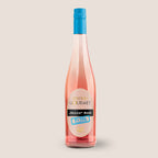 Flasche Edition Gourmet 0,0 Rosé der WZG mit roséfarbenem Getränk und blauem Flaschenverschluss.