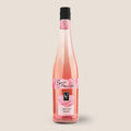 Flasche Sprizz & Fruchtig Secco Rosé der WZG mit roséfarbenem Getränk 